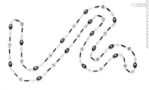 A rock crystal, onyx and diamond longchain, circa 1970