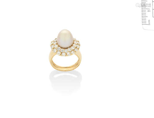 A cultured pearl and diamond cluster ring, by Grima