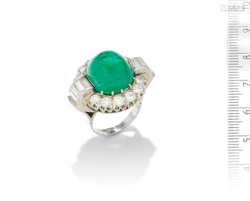 An emerald and diamond ring