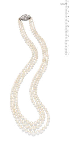A three-row natural and cultured pearl necklace with a diamond clasp, early 20th century