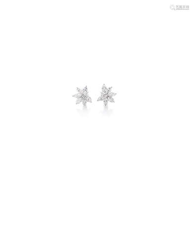 A pair of diamond earclips