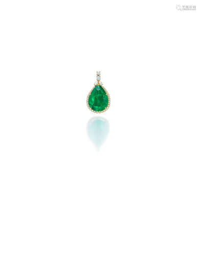 An emerald and diamond pendant