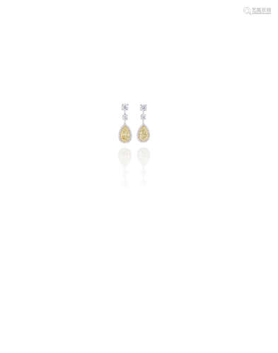 A pair of fancy colored diamond and diamond earrings