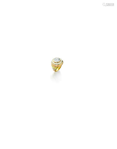 An 18k tri-colored gold and diamond ring