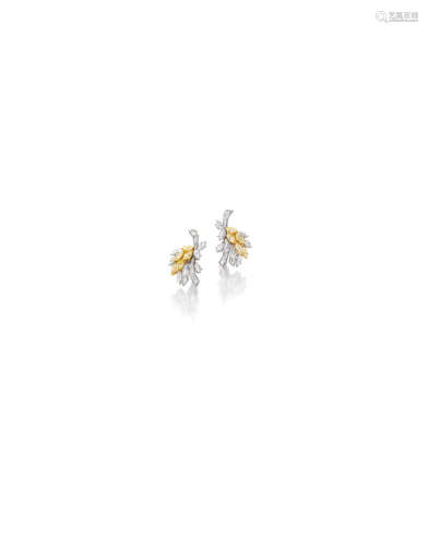 A pair of diamond and colored diamond earrings