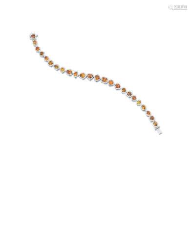 A colored diamond and diamond bracelet