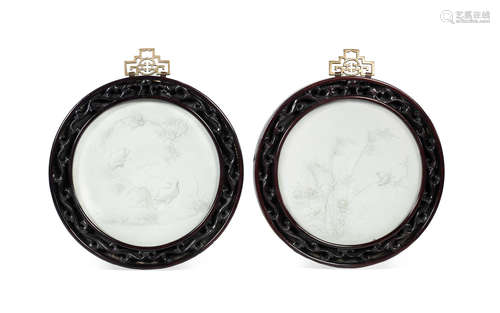 Late Qing Dynasty A pair of circular 'bird and flower' white biscuit plaques