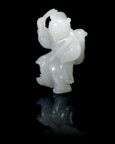 18th century  A white jade figure of boy