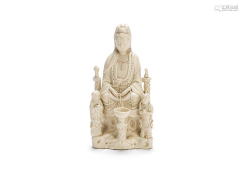 17th/18th century A blanc-de-chine figure of Guanyin and her acolytes