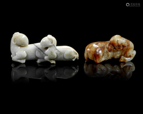 Ming Dynasty and later A 'chicken bone' jade carving of two rams and a russet jade carving of a horse