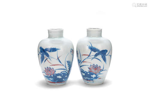 Yongzheng six-character marks, 20th century A pair of copper-red and underglaze-blue baluster vases