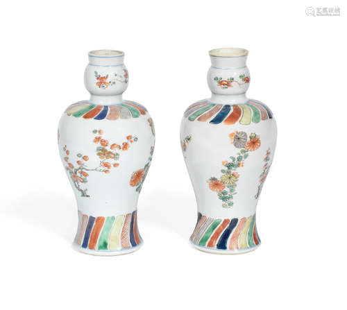 Kangxi A matched pair of gilt-decorated wucai 'floral' baluster vases