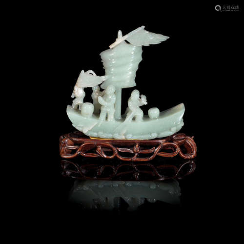 19th century A pale green jade carving of a sailing boat with crew