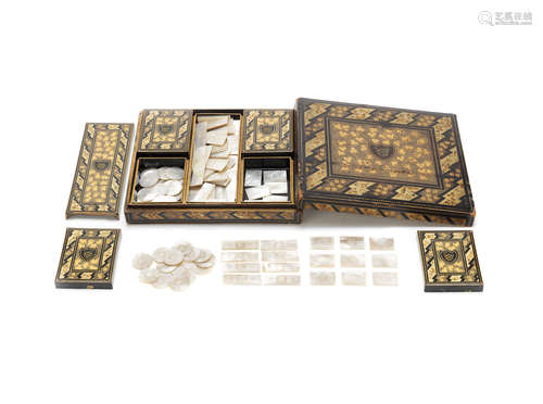 Meiji Period An export gilt-lacquer games box and set of mother-of-pearl counters