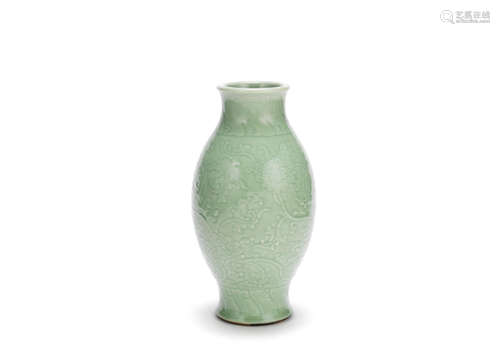 Chenghua four-character mark, 18th century A carved celadon-glazed 'lotus' vase, ganlanping