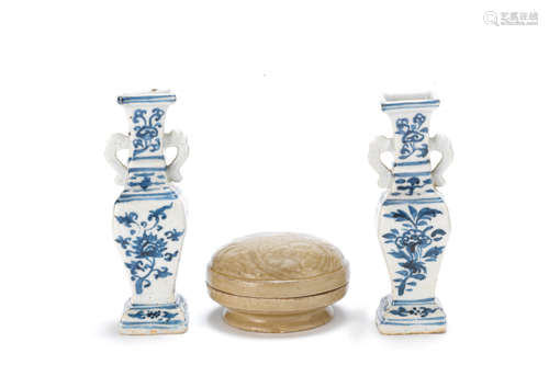 Song and early Ming Dynasties A Yue-type moulded box and cover and a pair of small blue and white baluster vases