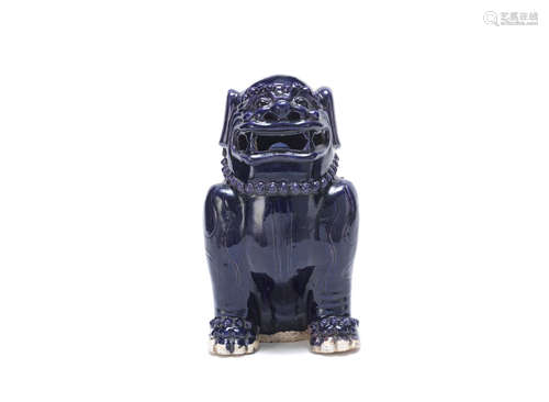 Kangxi An aubergine-glazed model of a Buddhist lion