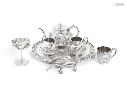 Luenwo stamped marks, circa 1900 A Chinese export repoussé silver four-piece tea set