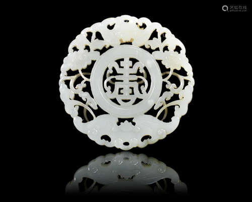 19th century A white jade circular 'shou' plaque