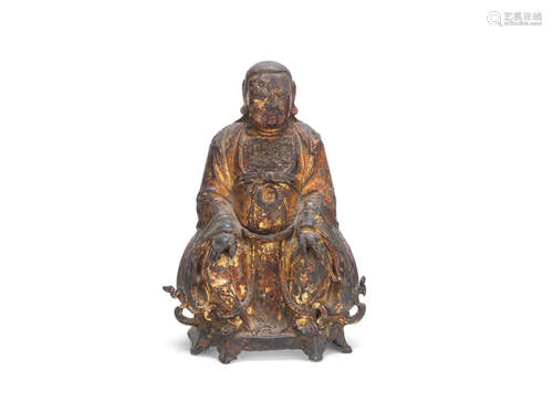 Ming Dynasty A gilt-lacquered bronze figure of Zhenwu