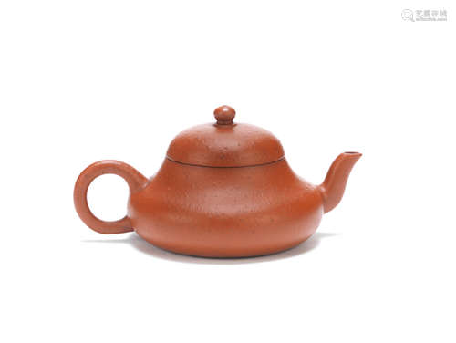 Qing Dynasty An Yixing compressed pear-shaped teapot and cover