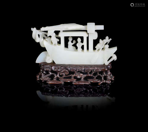 19th century A white jade carving of a sampan with figures