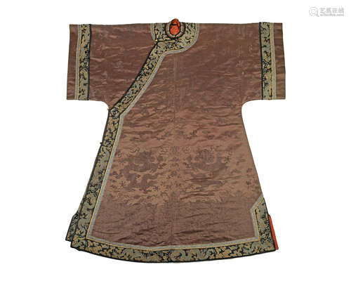 The robe early 19th century, the brocade trim circa 1900 A brown silk damask informal robe