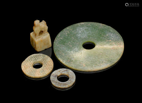 Han Dynasty or later Three green and russet jade bi discs