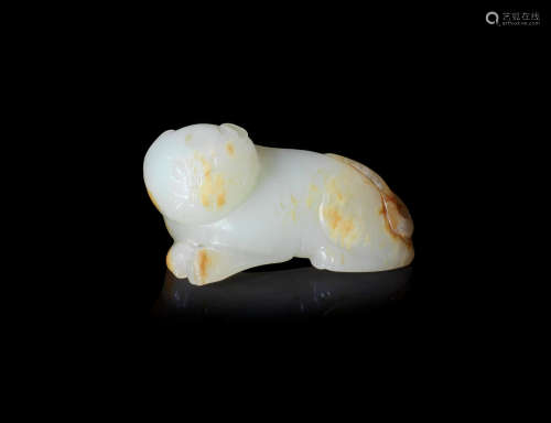 Ming Dynasty A pale green and russet jade carving of a cat