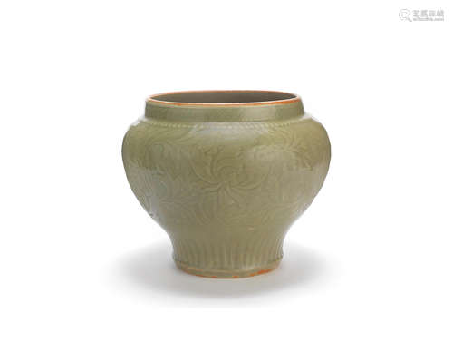 Yuan/Early Ming Dynasty A carved Longquan celadon-glazed jar, guan