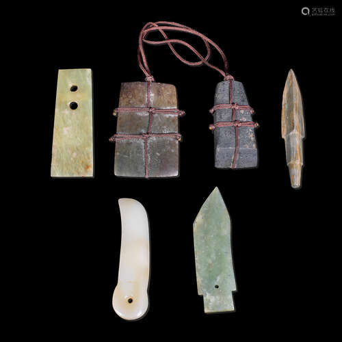 Neolithic Period to Zhou Dynasties A selection of blades and axe heads