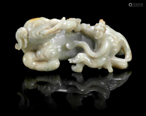17th century or later A mottled green jade carving of an elephant and foreigner