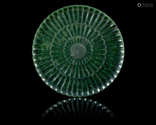 18th/19th century A spinach green 'chrysanthemum' plaque