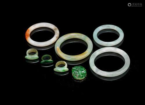 Early 20th century A group of jadeite bangles and rings