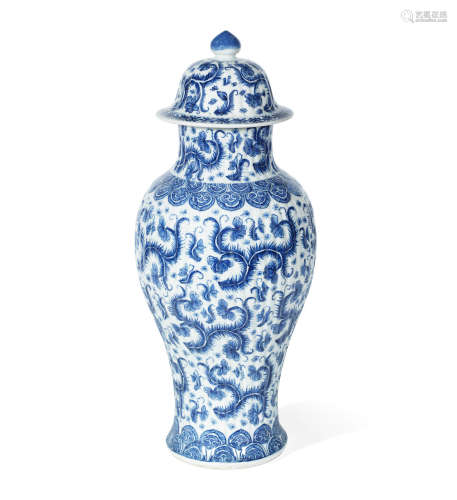 Kangxi A blue and white moulded baluster vase and cover