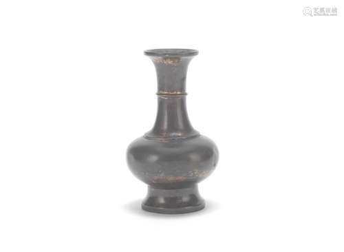 Ming Dynasty A small bronze bottle vase and a reticulated bronze tool vase