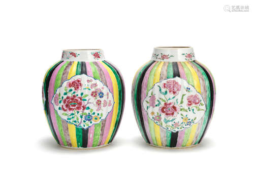 Early 18th century A matched pair of famille rose striped-ground lobed jars