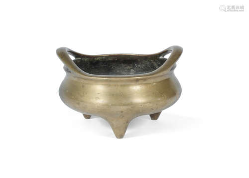 Xuande six-character mark, 18th century A gilt bronze tripod incense burner