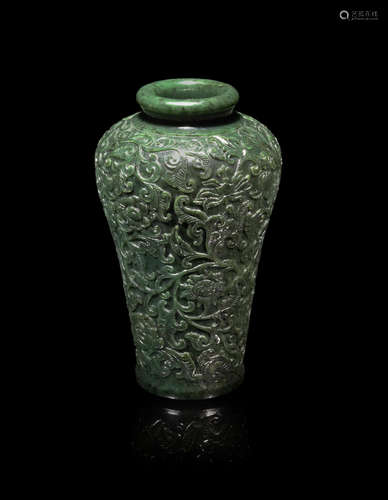 Qianlong four-character mark, Republic Period A large spinach green jade 'lotus scroll' vase, meiping