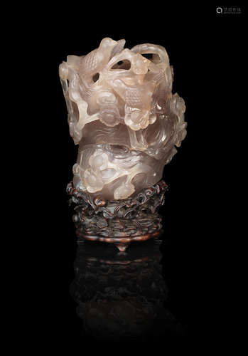 19th century A large carved agate 'prunus and magpie' trunk-form vase