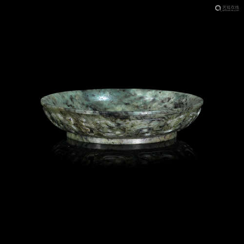 Carved Qianlong seal mark, Qing Dynasty A small archaistic spinach green jade dish