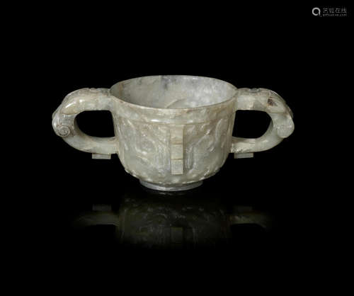 Ming Dynasty A mottled green jade archaistic two-handled cup