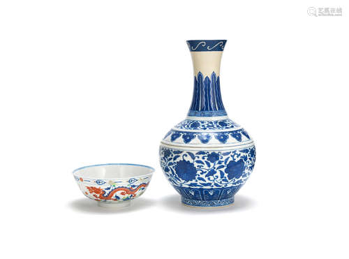 Mid-19th century A blue and white 'award' bottle vase and a wucai 'dragon and phoenix' bowl