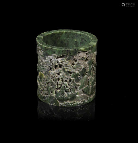 20th century A carved spinach green jade brush pot