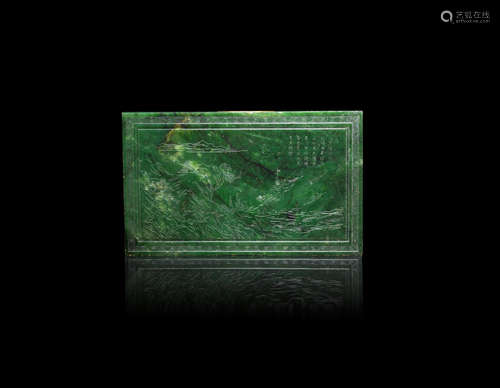 20th century A spinach green jade 'landscape' plaque