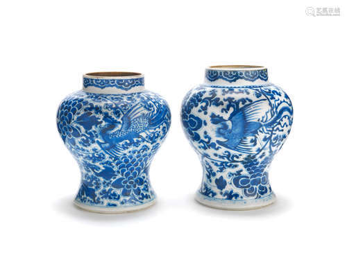 Kangxi A matched pair of blue and white 'phoenix' baluster vases