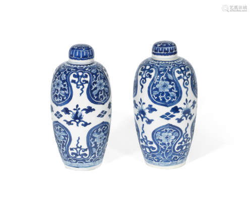 Kangxi A pair of blue and white oviform jars and covers