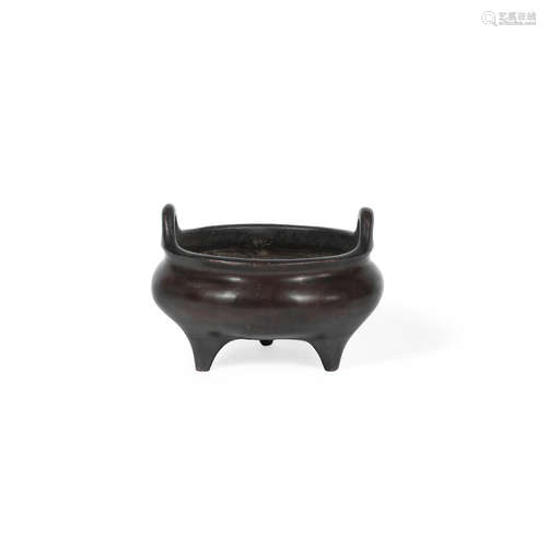 Xuande six-character mark, 17th/18th century A bronze tripod incense burner