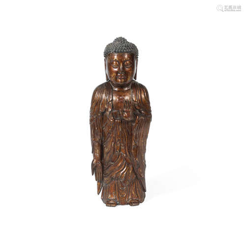 17th century A gilt-lacquered wood figure of Buddha