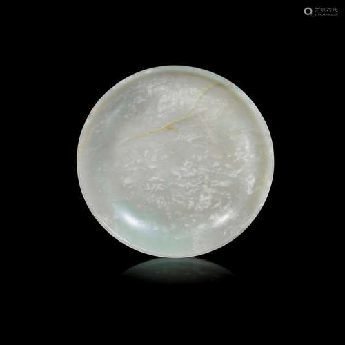 Qianlong seal mark and of the period A pale green jade shallow dish